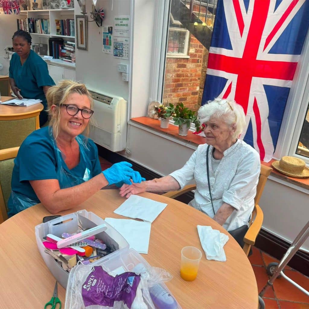 Resident enjoying a manicure
